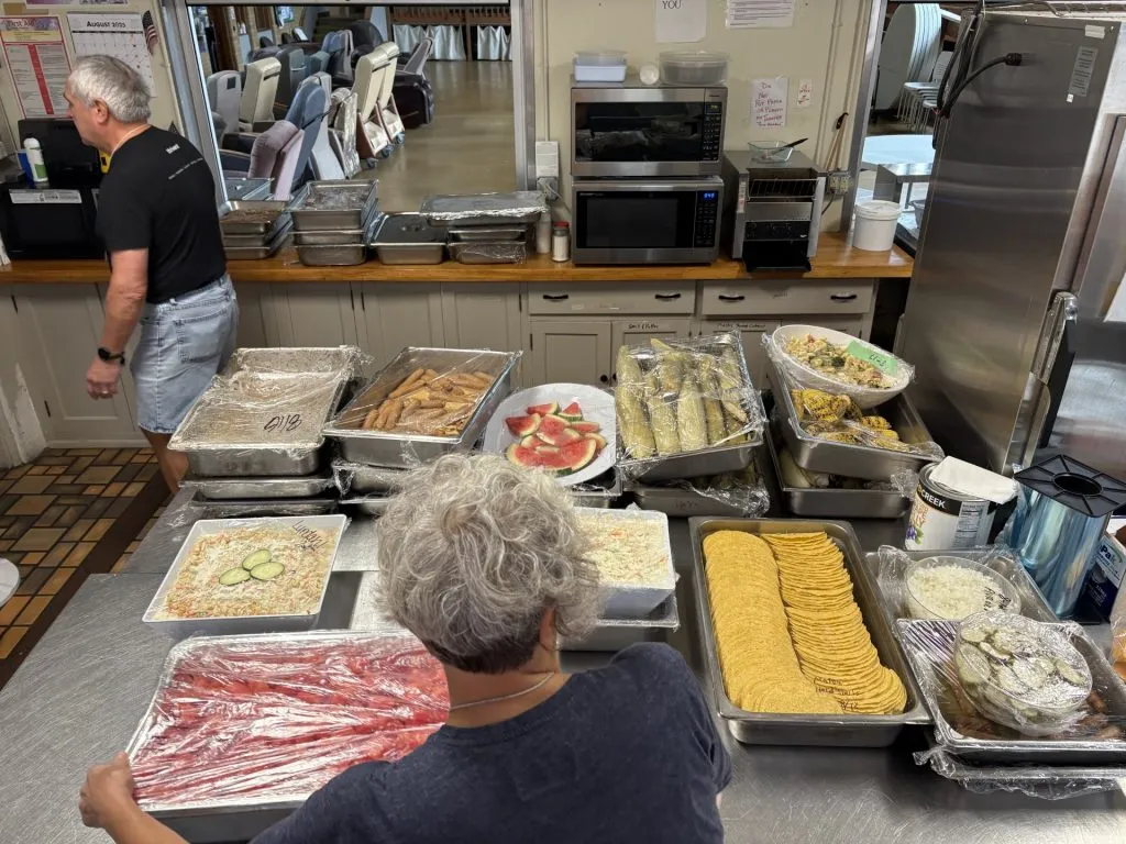 metal table with trays of food