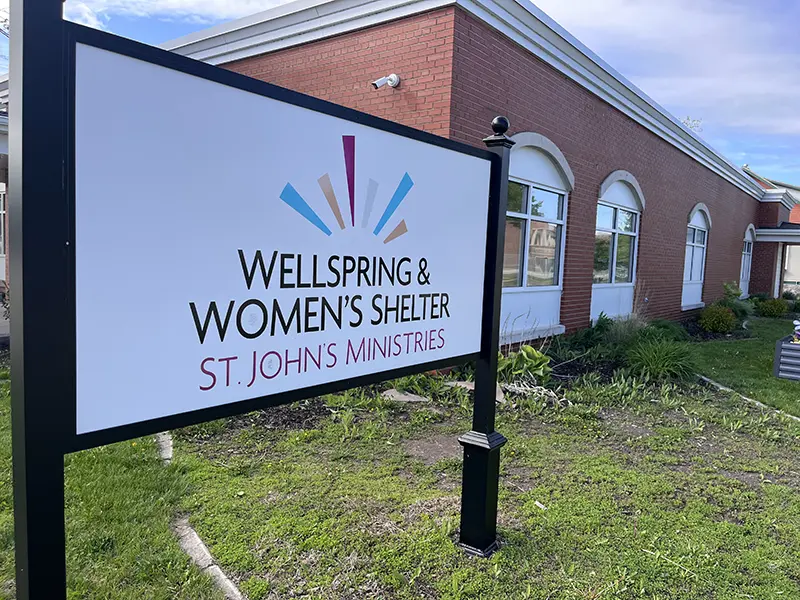 Wellspring & Women's Shelter sign