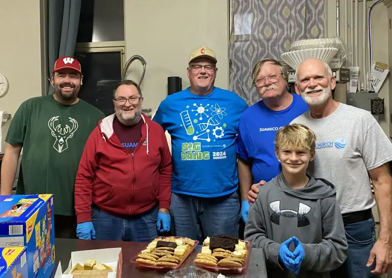 Volunteer meal team of 5 men and one boy