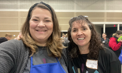 two women smiling